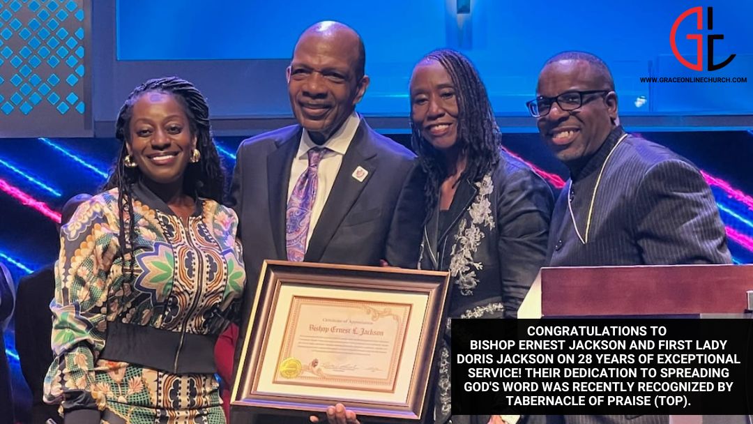 Bishop Ernest L. Jackson receiving a Certificate of Appreciation for 28 years of service, surrounded by friends and church leaders.